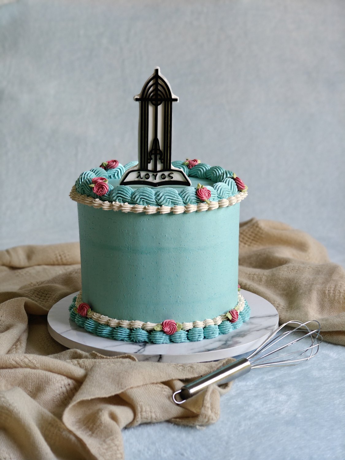 Sage green birthday cake with fondant cathedral